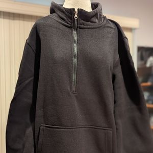Black pullover with kangaroo pocket and patched elbows by Wicked Stitch